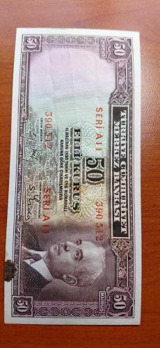 NADİR 2. EMİSYON İNÖNÜ 50 KURUŞ BATAN GEMİ 50 KURUŞ PARADA DENİZDE KALMASINDAN DOLAYI DALGALANMA VARDIR