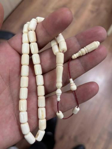 Orjinal Mahmut dişi fosilden yapılma obje fotoğrafını ekledim Mahmut  dişi fosil tespih gönderirim antika 23. 50 gram işçilik bana aittir.
