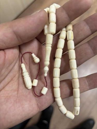Orjinal Mahmut dişi fosilden yapılma obje fotoğrafını ekledim Mahmut  dişi fosil tespih gönderirim antika 23. 50 gram işçilik bana aittir.
