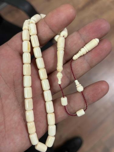 Orjinal Mahmut dişi fosilden yapılma obje fotoğrafını ekledim Mahmut  dişi fosil tespih gönderirim antika 23. 50 gram işçilik bana aittir.