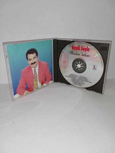 Cd İbrahim Tatlıses haydi söyle albümü. Orijinal. kırmızı bandrollü dönem baskı albüm. Dinlemeyi etkilemeyen çizikler var sorunsuz çalışıyor