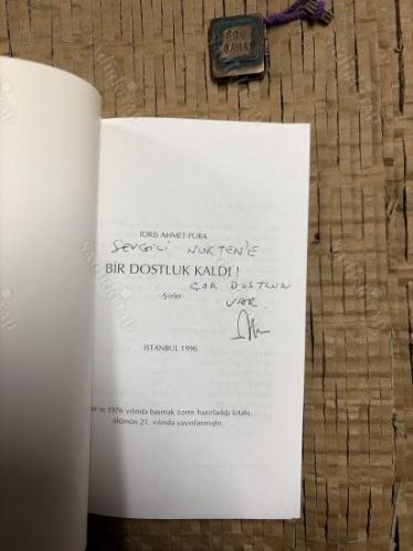 bir dostluk kaldı/ithaflı imzalı!