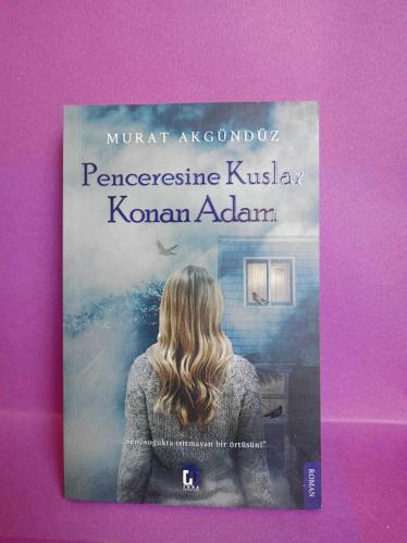 PENCERESİNE KUŞLAR KONAN ADAM  2.EL