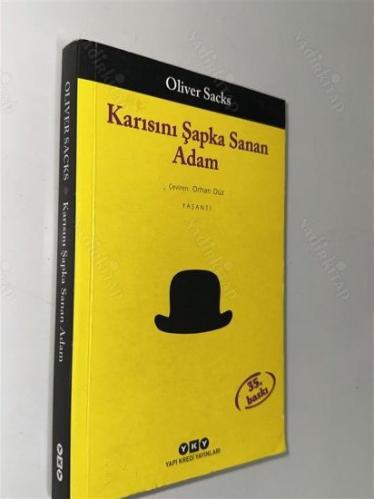 Karısını Şapka Sanan Adam