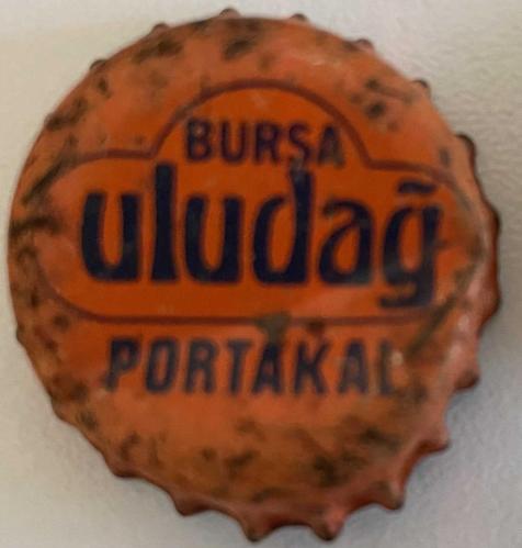ULUDAĞ GAZOZ  PORTAKAL.KAPAĞI .HALİYLE RESİMDEKİ ÜRÜN