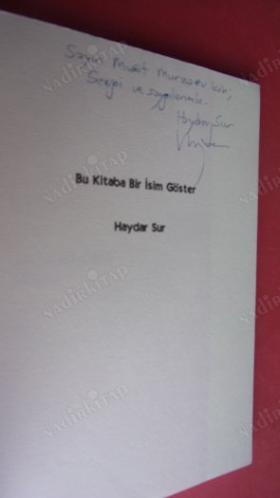 BU KİTABA BİR İSİM GÖSTER. İMZALI .