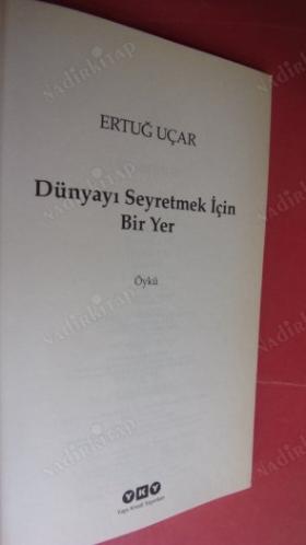 DÜNYAYI SEYRETMEK İÇİN BİR YER - Birinci BASIM - ( ayraclı )