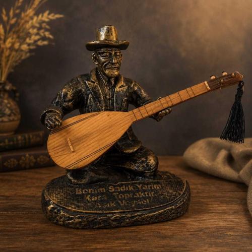 vintage ''benim sadık yarim kara topraktır''temalı Aşık Veysel döküm biblo & 16 cm