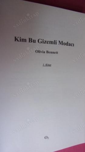 KİM BU GİZEMLİ MODACI-ÇAĞDAŞ DÜNYA EDEBİYATI ROMAN