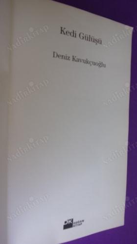 KEDİ GÜLÜŞÜ