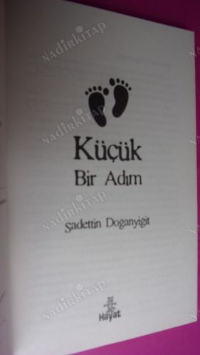 KÜÇÜK BİR ADIM