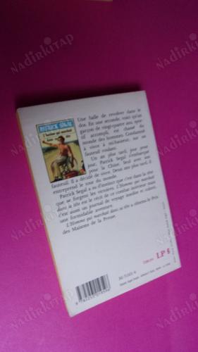 L'bomme qui marcbait dans sa tete