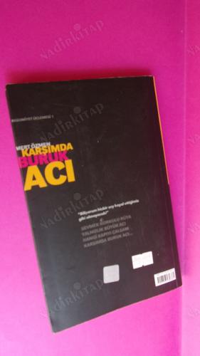 KARŞIMDA BURUK ACI