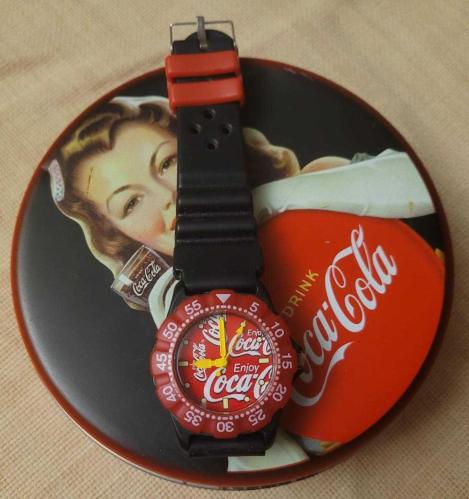 LOT.3 » TÜRKİYE'DE TEK. ORİJİNAL LİSANSLI UNİSEX COCA COLA SAATİ. TENEKE KUTUSUNDA. SIFIR GİBİ.