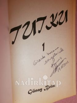 TUTKU ** İMZALI**