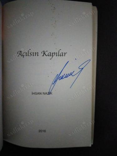 Açılsın kapılar imzalı