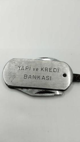 ANAHTARLIK 1970 Lİ YILLAR '' YAPI KREDİ BANKASI '' NIN MUDİLERİ İÇİN YAPTIRDIĞI PROMOSYON AÇACAKLI/ÇAKILI ANAHTARLIKTIR 332