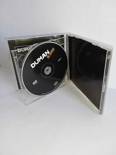 Vcd Duman Bu akşam Konser Cd si. Orijinal. 2 Disk. Diskler 10 üzerinden 9-9.5 sorunsuz çalışıyor. Kartonet tertemiz koleksiyonluk