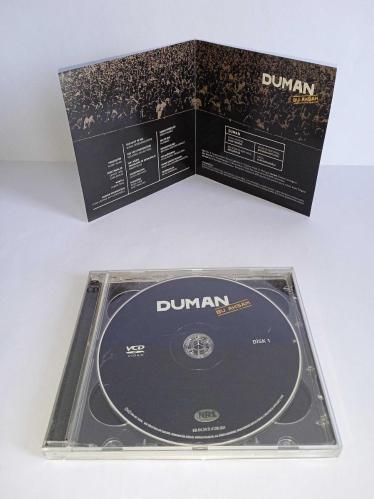 Vcd Duman Bu akşam Konser Cd si. Orijinal. 2 Disk. Diskler 10 üzerinden 9-9.5 sorunsuz çalışıyor. Kartonet tertemiz koleksiyonluk