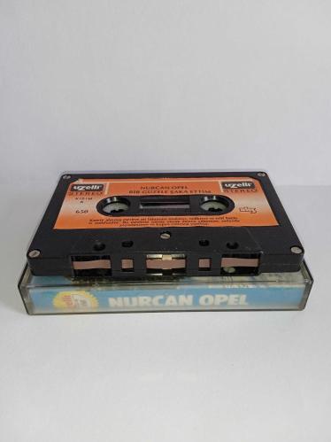 Kaset Nurcan Opel bir güzele şaka ettim albümü. Orijinal. 650 Uzelli Gema dönem Kağıt Baskı. Sorunsuz çalışıyor. Koleksiyonluk