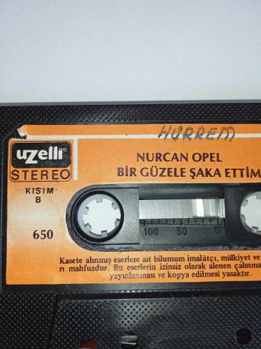 Kaset Nurcan Opel bir güzele şaka ettim albümü. Orijinal. 650 Uzelli Gema dönem Kağıt Baskı. Sorunsuz çalışıyor. Koleksiyonluk