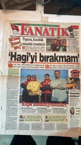 FANATİK SPOR GAZETESİ - TURKISH NEWSPAPER - DOĞUM GÜNÜ HEDİYESİ  - EKSİKSİZ TAM TAKIM GAZETE - 7 NİSAN 1999 - SAYI:1235 - FATİH TERİM - CÜNEYT KARAKAYA - İSMET BADEM - LÖW - HAGİ - HAKAN ŞÜKÜR - OKAN - OGÜN - FELDKAMP - ALPAY - BERKE - DEMET AKALIN - EBZU ŞAH - CANSU - MEHMET GENÇ - BURHAN USLU - TOM - NAUMOSKI - - DOYUMSUZ TERİM - POPESCU BU HAFTA YOK - CİM BOMLU KIZLAR FİNALE UZANAMADI - FENER’İN LİDERİ YOK - ŞAMPİYONLARIN YARI FİNAL SINAVI - AHMET GÜLÜM’E ÖNEMLİ GÖREV - RUSYA’DAN RALLİ HATTI - FANATİK’E BÜYÜK ONUR - TARAFTAR REVİZYON İSTİYOR - MİNİK KARTALLAR PODYUMDAYDI - MAÇLAR AYNI SAATTE OYNANSIN - TRABZON’DA ORTA ALAN SIKINTISI - SÜPER LİG 2001’DE - HÖGH’Ü AFFEDEMEM - RÜŞTÜ’YE İZİN YOK - BALİÇ’E ELEŞTİRİ - YENİ KAPTAN İLKER - RÜŞTÜ VE HÖGH’E CEZA - NAUMOSKİ YOLCU - OKULLARA GİTTİK - CİM BOM’A RUMEN ŞOKU - POPESCU OYNAMIYOR - HAGİ’Yİ BIRAKMAM - GENÇLERDEN UMUTLUYUM - KUPA KOLEKSİYONCULARI - YENİLGİ SAYISI SADECE 18 - KARDEŞ KARDEŞ OYNARIZ - - CİM BOMLU KIZLAR 47-54 RUZOMBEROK -