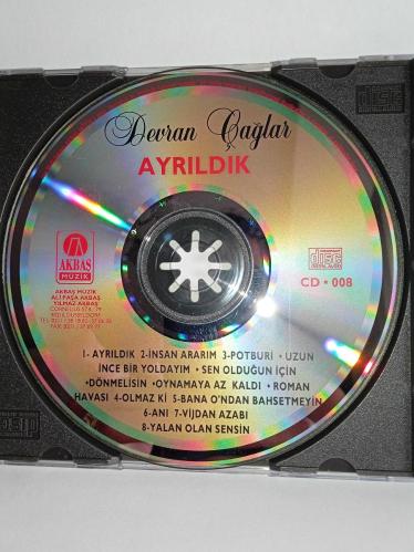 CD Devran Çağlar ayrıldık albümü. Orijinal AKBAŞ Müzik ALMAN baskı dönem albüm. Disk 10 üzerinden 9.8 Tertemiz sorunsuz çalışıyor. NADİR Koleksiyonluk